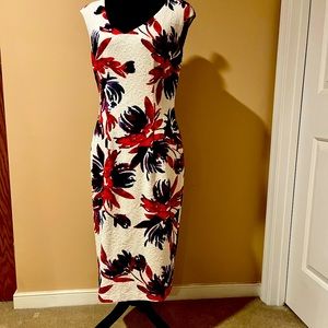 Cap sleeve Maggy London colorful over white background.